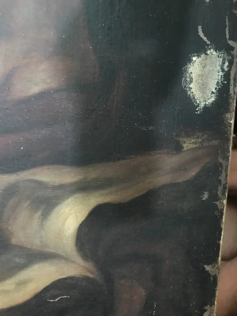 Óleo antiguo, figura de anciano con libro — detalle de daños y pérdidas · restauración de cuadros